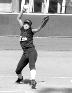Diana Cortez prepares to throw a pitch Tuesday against the Falcons.