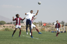  Luis Paz jumps to receive a pass from fellow teammate; Paz remains hopeful of his team's success this season 