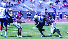 Running back Ken Ashley runs the ball in for the first touchdown of the game during the first quarter against the EC Compton Center. This win placed EC as the No. 1 ranked team among Southern California Community Colleges