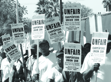 Silverline workers protest recently in front of the Administration building against what they claim are unfair labor practices of the company.