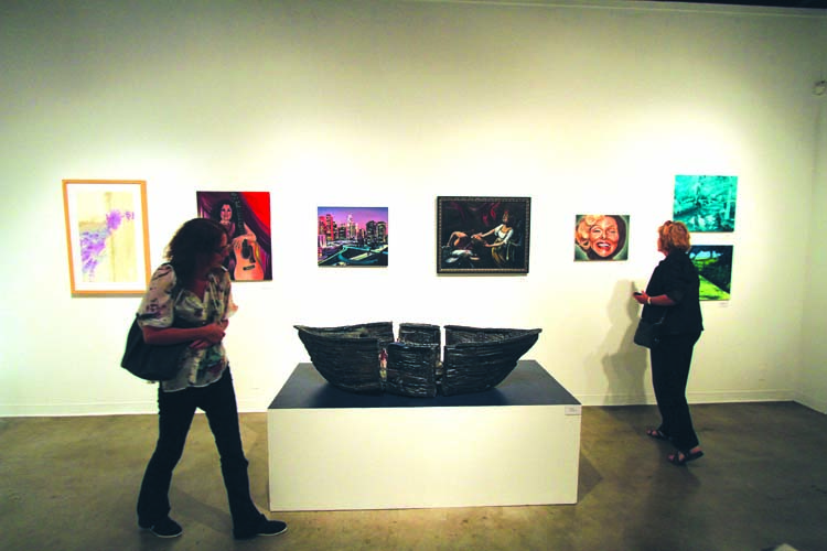 Art exhibit reception features live art performances by students