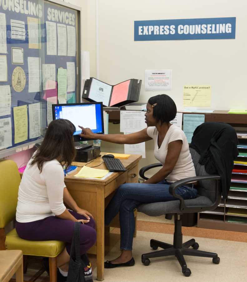 Lorena Solis, 35, nursing major (left), meets with adjunct counselor, Lorenda Johnson, (right) to discuss what classes she still needs to fulfill the requirements of her major. The Express Counseling service offered by EC helps students with quick questions regarding academics, such as prerequisites and major requirements. Photo credit: Gilberto Castro