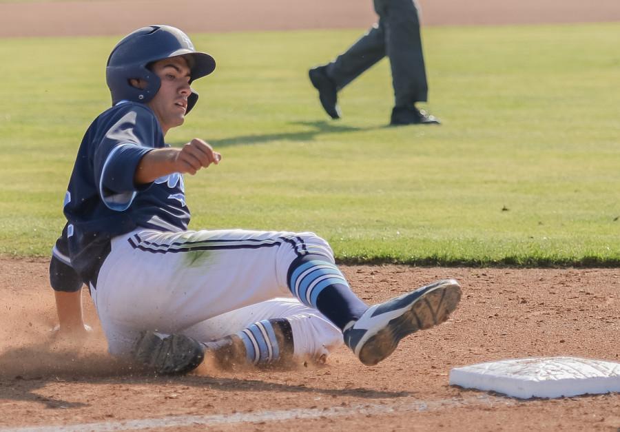 Sophomore Outfielder Kevin Lopez slides to 3rd base during El Caminos February 19th game against Imperial Valley. Lopez had 2 RBIs during the Warriors 5-3 victory over the Arabs.