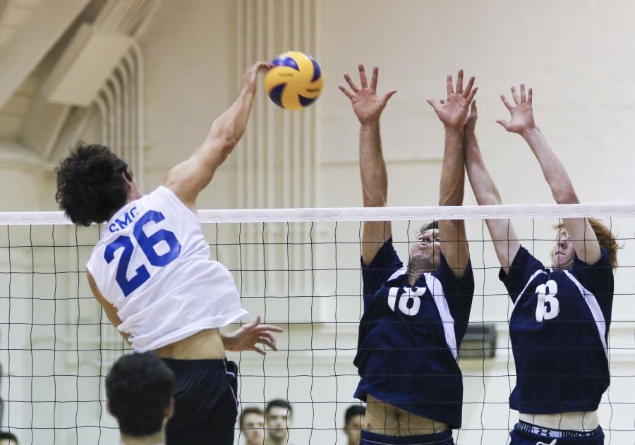 Warriors Casey Woods (left) and Josh Riblett attempt to block the ball against Daniel Vaziri from Santa Monica College. The Warriors lost at home 3-0 against Santa Monica on Wednesday night. Photo credit: Jorge Villa