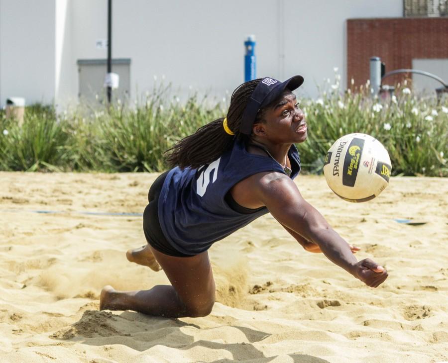 The sand volleyball teams Nickeisha Williams dives for the ball in an attempt to save the play against L.A. Valley College. The Warriors defeated the Monarchs 3-0 on Friday. El Caminos record stands at 27-9 so far this season. Photo credit: Jorge Villa