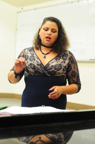 Tiffany Haile, 31, music major, sings a piece from the Italian play,“Rinaldo” by Handel in the Music Building.