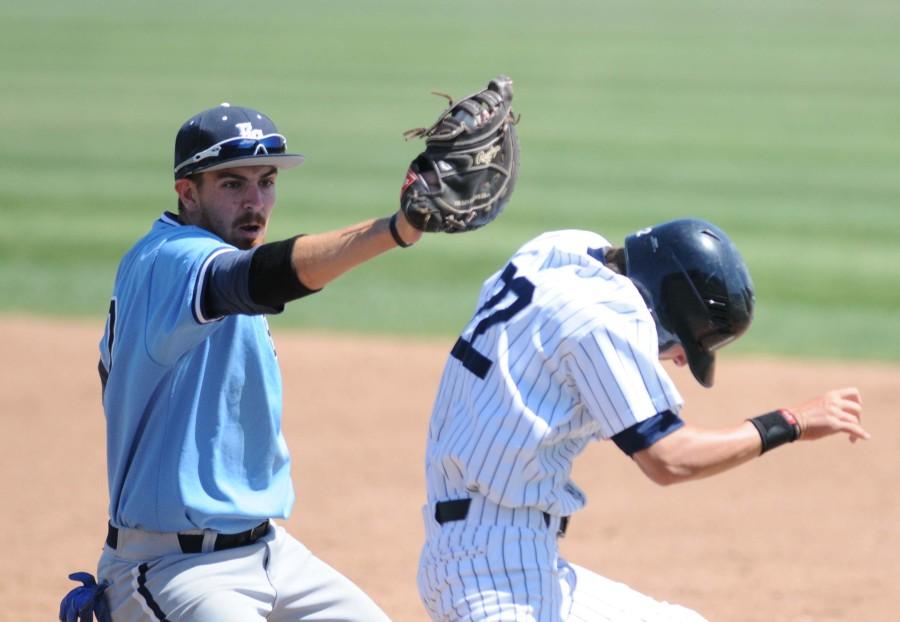 Warriors first baseman Jake Sahagian tags Cerritos College outfielder Kyle Carpenter out at first base in the bottom of the eighth inning. The Warriors fell to the Falcons 7-6 on Saturday afternoon. Photo credit: John Fordiani
