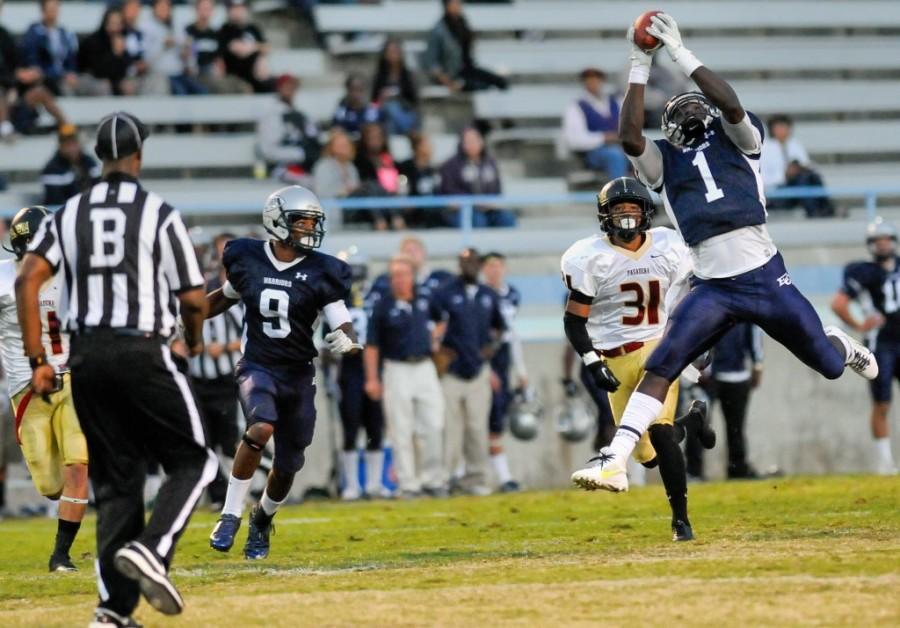 FILE - Tight end Jean Sifrin grabs the ball for one of his four receptions against Pasadena City College in 2013. (Union Photo/ Robert Chernetsky, File)