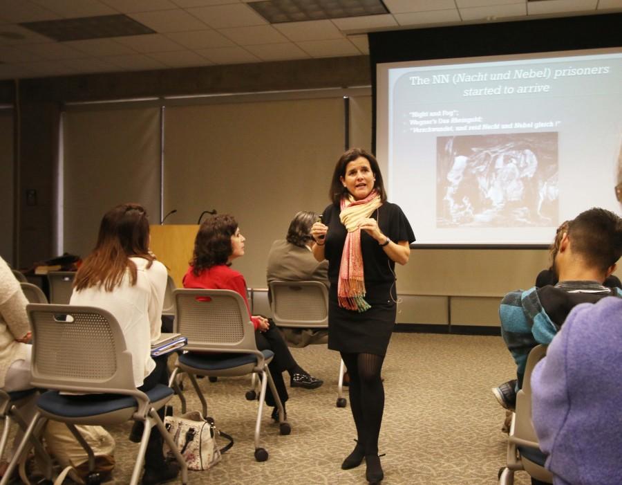 Silvia Ribelles de la Vega exhibits the history of Spaniards in the Holocaust for the 70th Anniversary of the Liberation on Tuesday in the Alondra Room. Photo credit: Jorge Villa