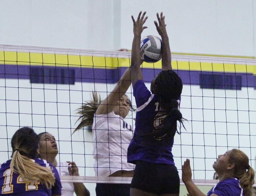 Sophomore middle blocker Nia Masui spikes the ball during an away game at L.A. Trade Tech College. Wednesday, Oct. 7. The Warriors defeated LA Trade Tech, 25-5. Photo credit: Jo Rankin