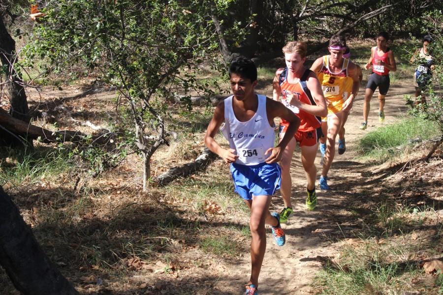 Freshman Solomon Kanehailua leads the middle of the pack for El Camino at the Brubaker Invitational on Friday, placing 28th overall behind freshman teammate, David Hodges, who placed 22nd overall. Photo credit: Roy Garza