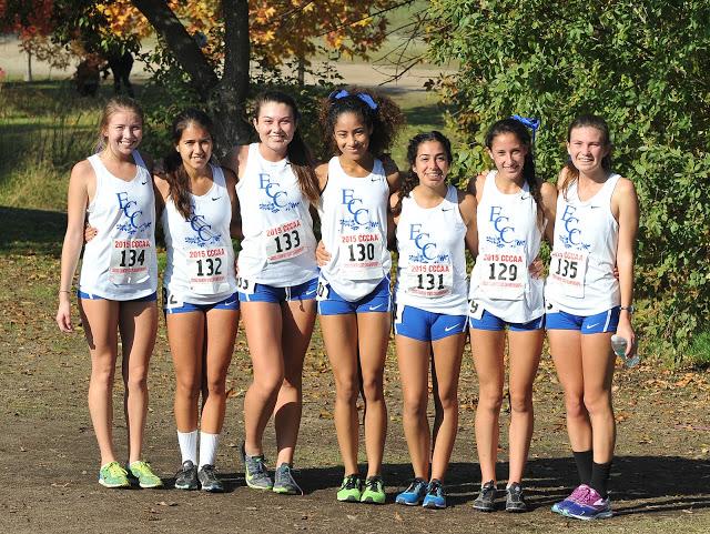 The womens cross-country team pose for a final time after the State Championship. The Warriors ranked 13 to finish the season. Photo courtesy of coach Dean Lofgren.