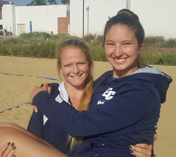 Sophomore Sadie Fraker carries Laynie Thompson, sophomore, after practice on Tuesday, March 1. The two teammates represent both halves of the No. 1 pair from El Camino's beach volleyball team. Photo credit: Phil Sidavong