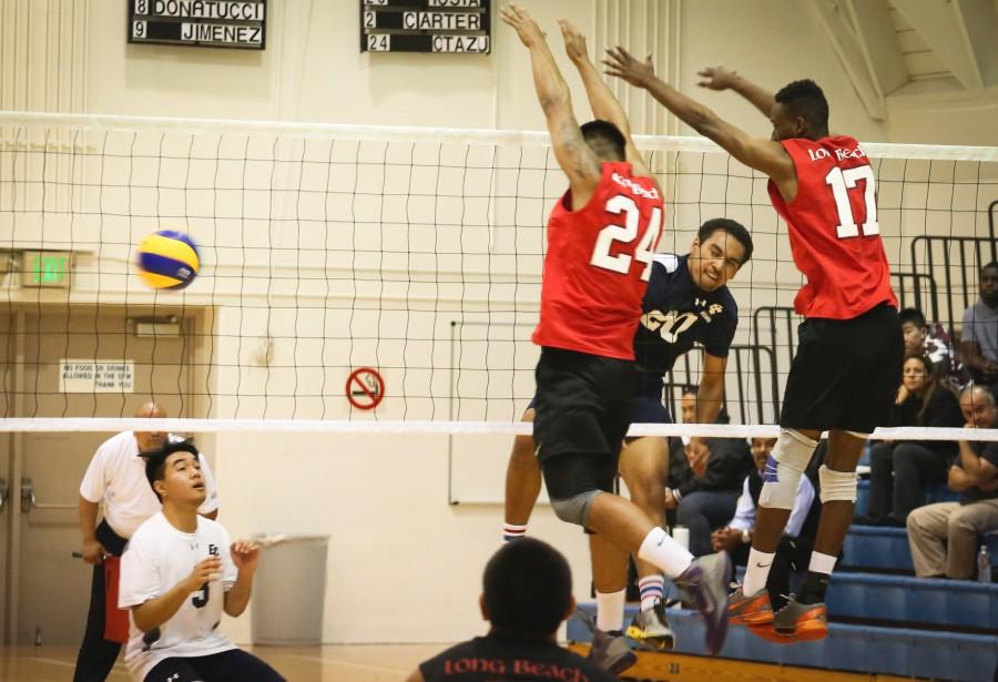 Nehemiah Iosia, outside hitter spikes the ball in set two against the Vikings during a home game on April 6. Photo credit: Sue Hong