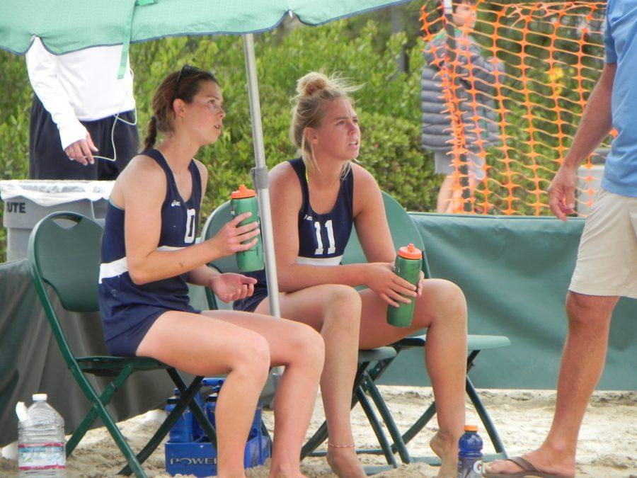 Emily Reinking (left) and Hailee Earnest, of Irvine Valley College, sit down and listen to their coach in between set one and two of the championship match at Grossmont on Sunday.
Reinking and Earnest were the No. 3 overall seed and beat the No. 4 seed of Cady Francis and Brianna Sizemore in two sets in the finals, 21-15, 21-18. Photo credit: Phil Sidavong