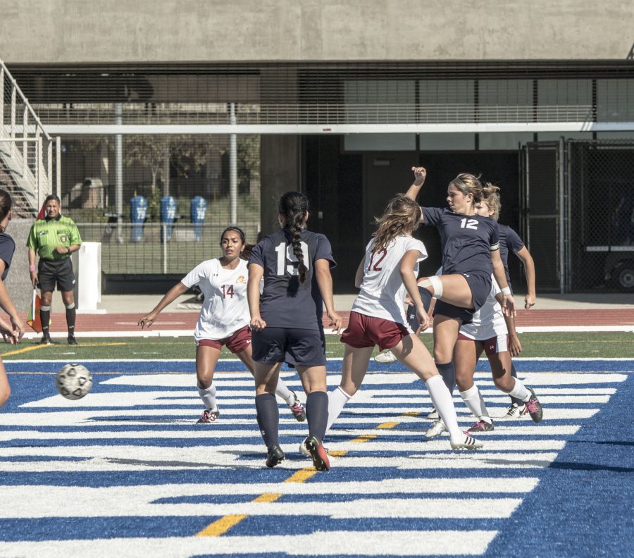 El Camino midfielder  Kalyn Kaemerle (No. 12) shoots for the first of her two goals versus Pasadena City College on Oct. 25, at Murdock Stadium. A knee injury sidelined Kaemerle for the majority of the second half. Photo credit: Elijah Hicks