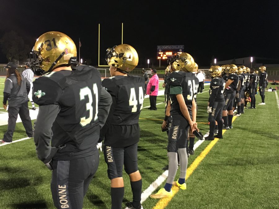 The Narbonne High School football team is on the sideline for their game against San Pedro on Oct. 28, at Murdock Stadium. Photo credit: Eric Ramos