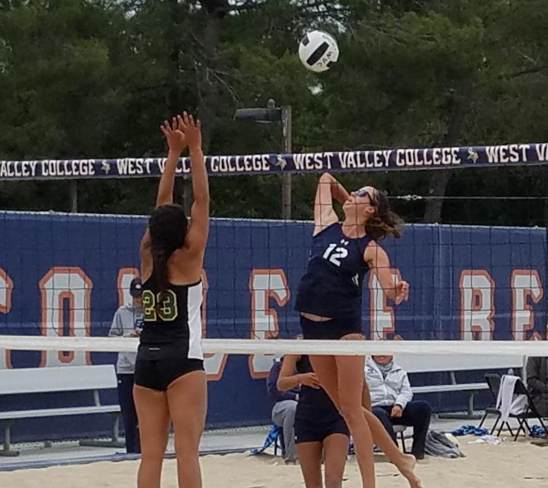 Freshman+El+Camino+beach+volleyball+player+Micah+Hammond+attacks+the+ball+against+Feather+River+Colleges+Cyan+Blackdeer+in+the+Round+of+16+in+the+State+Individual+Tournament+on+Saturday%2C+May+6.%0A%0AHammond+and+partner+sophomore+Michelle+Shimamoto+advanced+all+the+way+to+the+State+Finals+match+on+Sunday%2C+May+7+and+eventually+lost+to+claim+second+place.+Photo+credit%3A+Phil+Sidavong