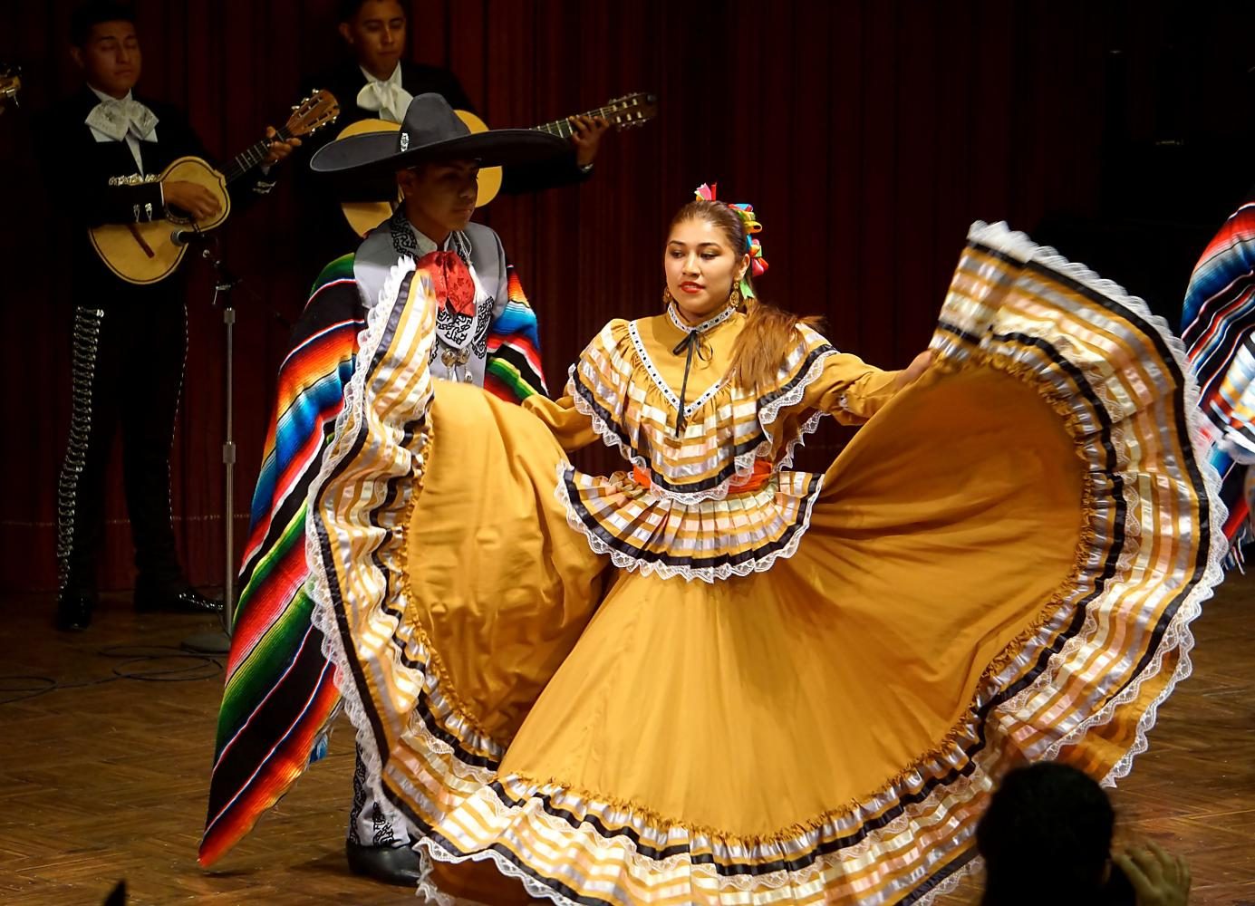 Alejandro Munive, 16, high school student (on the left) dancing a Son called, El Gavilan with his dance partner Janet Velazquez, 19, undecided major during the Mariachi Music and Folklórico Dance concert in the Haag Recital Hall on Thursday, May 18. Photo credit: Selvin Rodas
