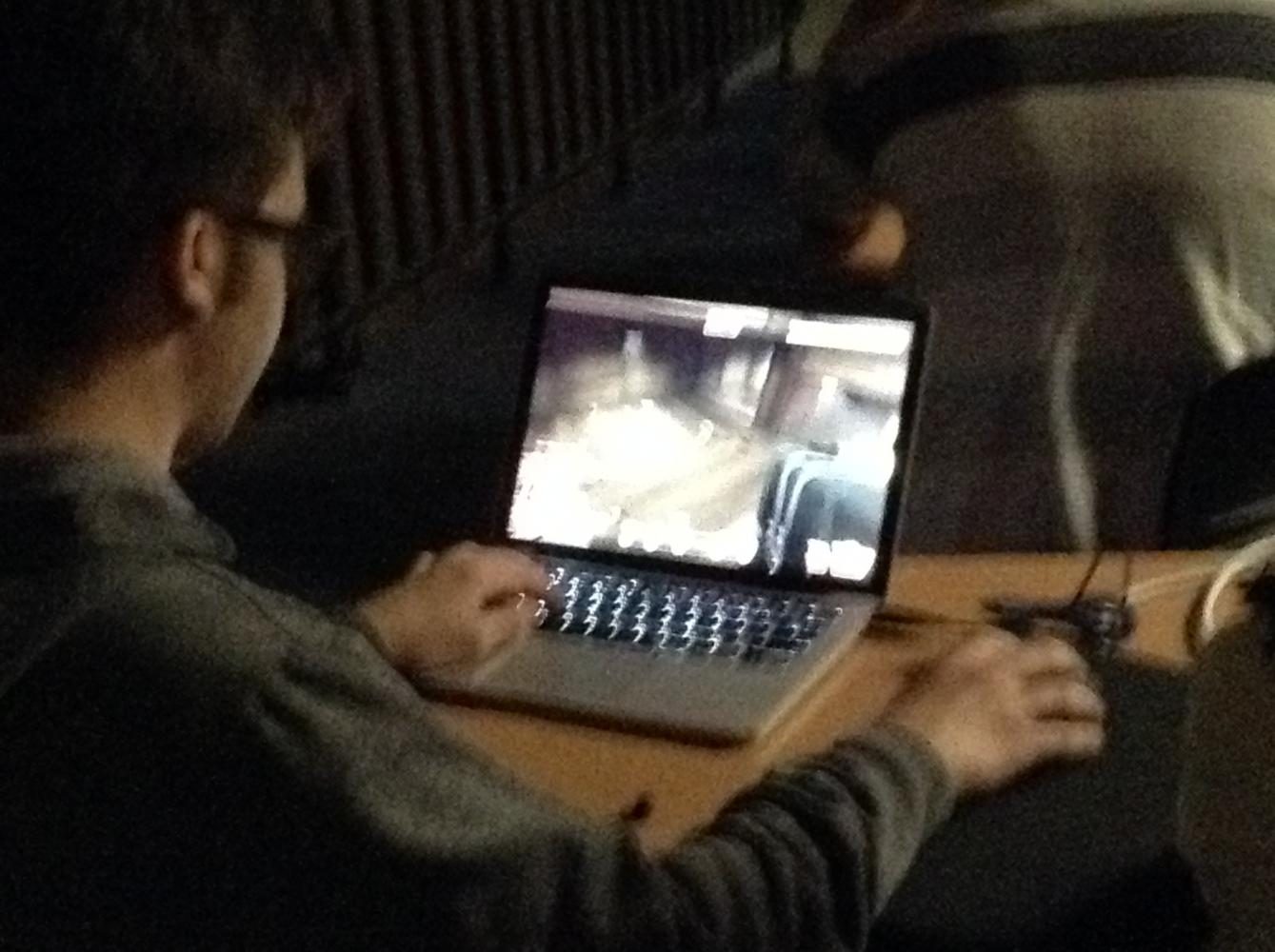 Michael Armato plays Team Fortress 2 on his laptop against another player in the room and others online during the El Camino Esports Club meeting. Photo credit: Don Perez