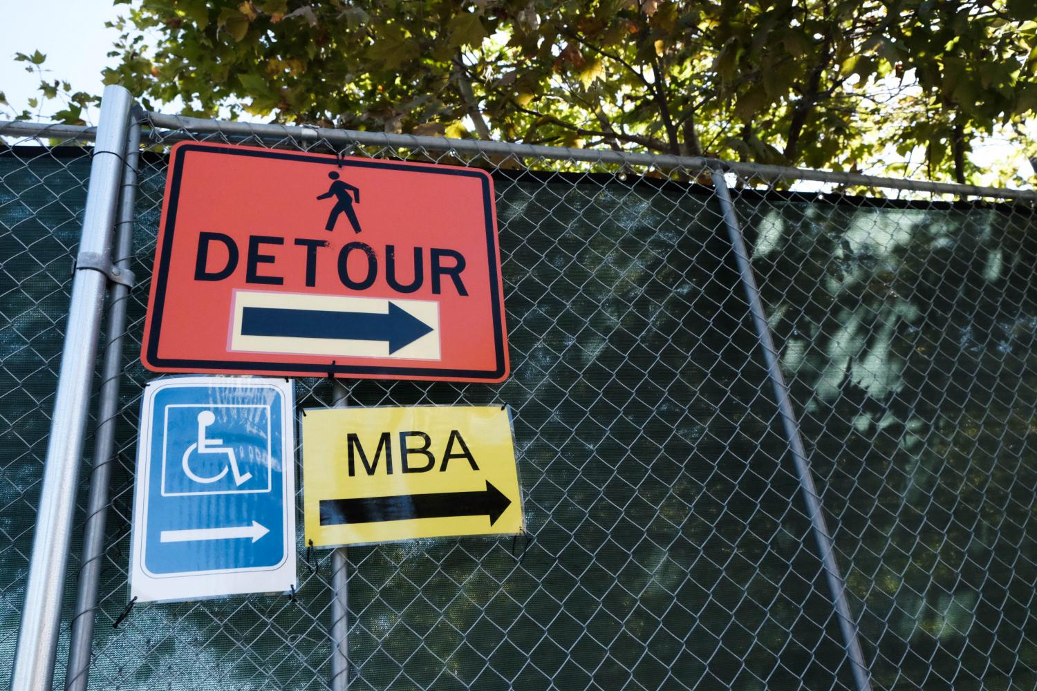 Signs indicate that pedestrians must take a detour around the Administration Building due to construction. Photo credit: Emma Dimaggio