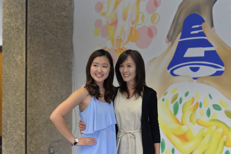 Haruka Kanemura poses for a photo with her mother after the mural reveal ceremony ended. Photo credit: Faith Petrie