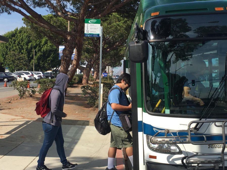 Students board a bus from a bus stop on Crenshaw blvd. Photo credit: Esteban Mendez