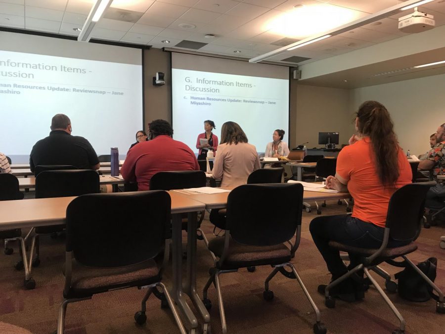 Faculty and students taking notes during a presentation given by Jane Miyashiro during the Academic Senate Meeting on Tuesday, Oct. 16 in the Distance Education Conference Room (DE116).