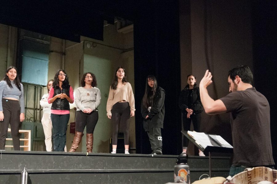The EC Theatre Department practices for their March opening night of In the Heights” on Feb. 21. With a diverse cast, the program is looking to bring life to a niche story about a Washington Heights barrio. Photo credit: Elena Perez