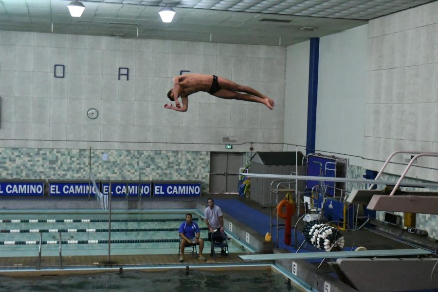 Ventura College diver Deon Crilly moments after jumping off the diving board at the South Coast Conference Diving Invitational being held at the EC Pool on Saturday, March 23. Photo credit: Jun Ueda