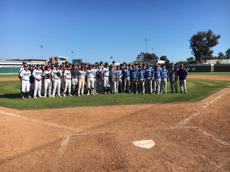 The El Camino Warriors and Fullerton Hornets baseball teams stand together following their game on Wednesday, April 17, at Warrior Field. The Warriors won the game 3-1 and improved their season record to 29-6. Photo credit: Melanie Chacon