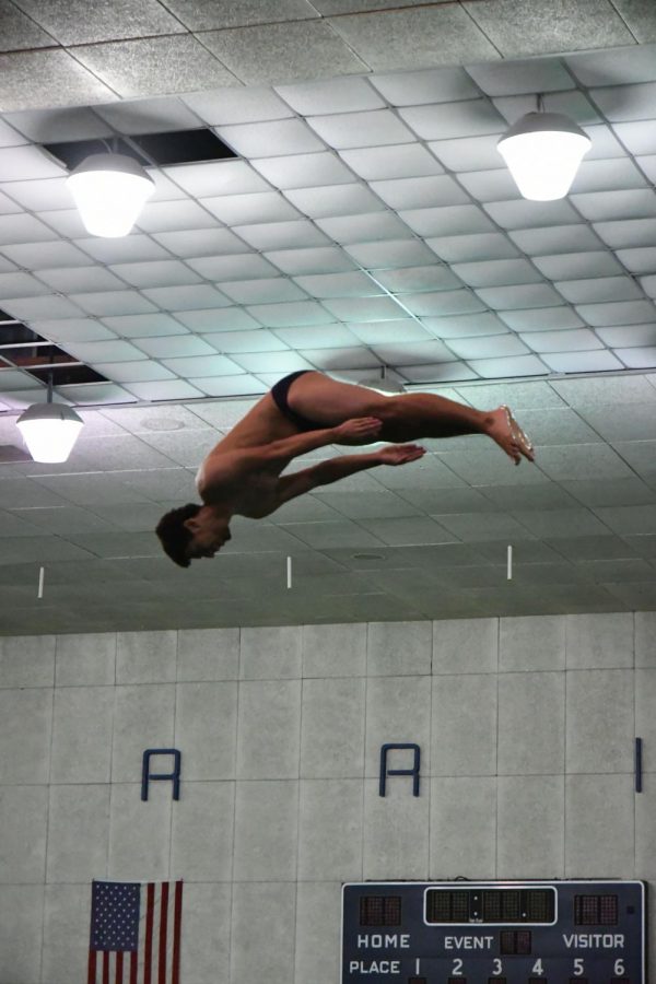 Taylor Trejo of the EC Warriors men’s diving team performing a dive during the South Coast Conference Diving Invitational on Saturday, March 23 at the EC Pool. Trejo is one of many Warriors divers competing at this years Southern California Diving Championships. Photo credit: Jun Ueda