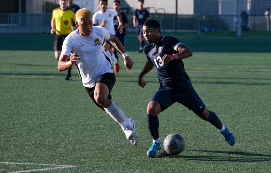 El Camino College mens soccer midfielder Melvyn Perez -Cortez moves the ball past a Pasadena College defender during a home game at the ECC Field on Tuesday, Oct. 29. The Warriors won 2-0. David Odusanya/The Union