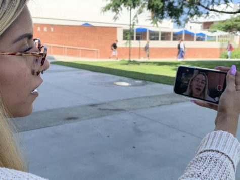 Ruth Maldonado, 19, psychology major, sings a cover of Lana Del Rey’s song “Lust for Life” outside of El Camino College’s Schauerman Library on Monday, Sept. 23 for her YouTube channel. “I want my voice to be heard,” Maldonado said. Patrick Ezewiro/The Union