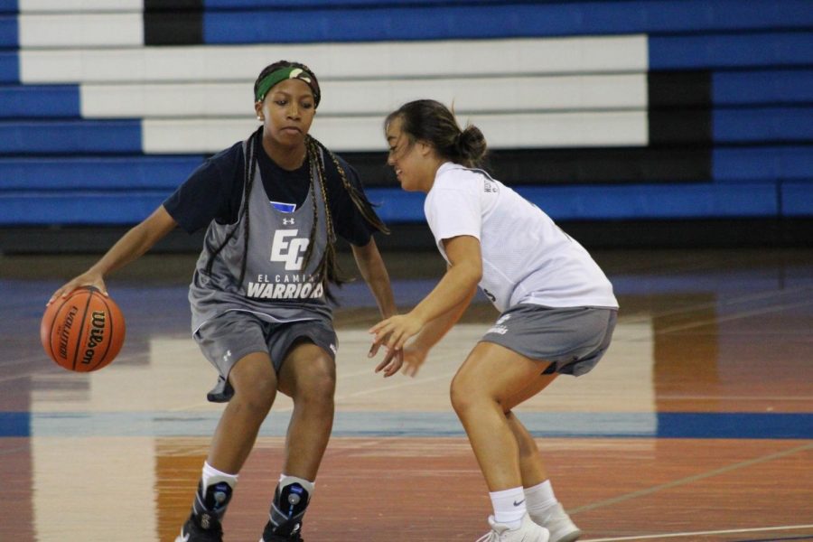 El Camino College basketball player Alexia Mason performs a behind the back dribble move on point guard Ashley Nguyen during practice on Tuesday, Oct. 8. Only three players will be returning from last years team. Jaime Solis/The Union