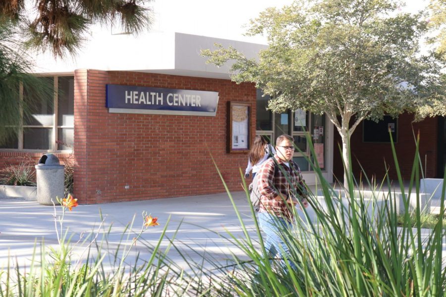 Students walk through campus and pass by the Health Center on Monday, Oct. 7. The student health fee recently increased during the fall 2019 semester to $21. Omar Rashad/The Union