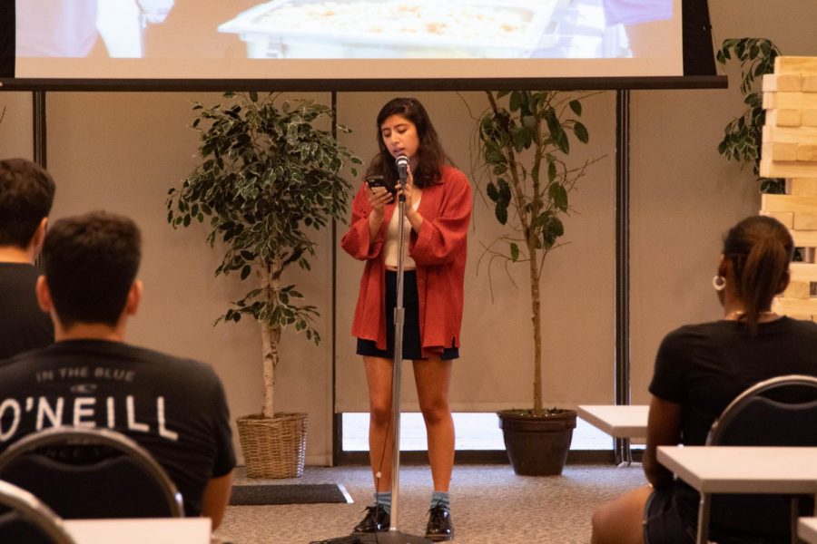 Leilani Padilla, 22, microbiology major, performs her poem To My City of Lost Angels during Noche de Cultura presented by El Camino Colleges Hermanas y Hermanos Club on Tuesday, Oct. 22, at the East Dining Room. Rosemary Montalvo/The Union