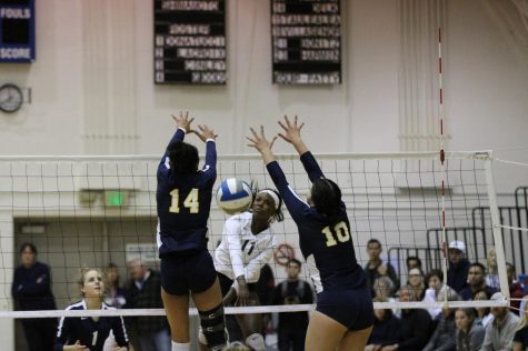 El Camino College womens volleyball outside hitter Mikayla Clark spikes the ball against the Fullerton College defense during the third set of their match on Tuesday, Nov. 26 in ECCs South Gym. The Warriors came back after losing the first two sets to advance in the regional playoffs. Jaime Solis/The Union