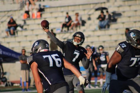 El Camino College football quarterback Jerman Gatoy attempts to deliver a pass to a wide receiver in the fourth quarter of the game against Cerritos College on Saturday, Nov. 16 at Murdock Stadium. Gotoy finished the game with 359 passing yards and three touchdowns while running for 20 yards and a touchdown. Jaime Solis/The Union