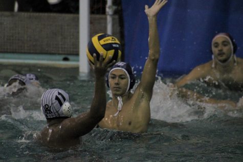 El Camino College mens water polo attacker Adian Morvice attempts to block Rio Hondo College attacker Jacob Ayala in front of the goal post during their game on Wednesday, Oct. 28 at the ECC pool. The Warriors clinched their first playoff berth since 1993. Jaime Solis/ The Union