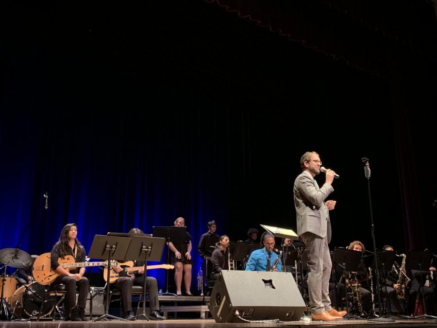 David Moyer, Director of Jazz Studies at El Camino College introduces the band and provides a brief explanation of the songs the audience will listen to during the concert in Marsee Auditorium on Wednesday, Nov. 20. Photo credit: Jose Tobar