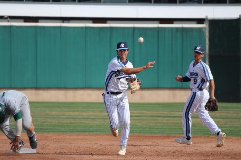 El Camino College shortstop Benny Casillas turns a double play in the third inning against East Los Angeles College in the game on Monday, March 9, at Warrior Field. The Warriors scored four unanswered runs to come from behind and beat the Huskies 4-3. Kealoha Noguchi/The Union