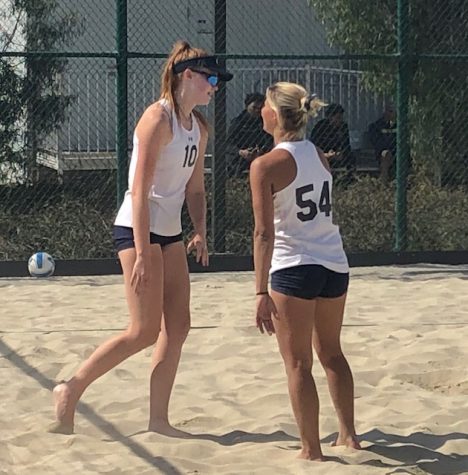 El Camino College womens beach volleyball players Brooke Drajos and Giulia Alessandri celebrating a point during their match against Cypress College on Friday, Feb. 28 at ECC sand courts. The Warriors won all 15 matches they played in the three game schedule. Logan Tahlier/The Union