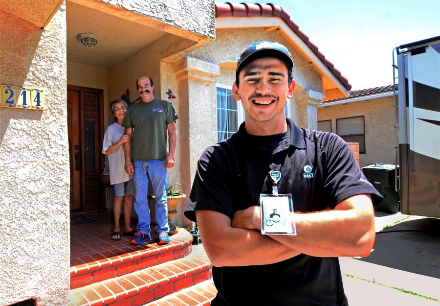 EMT Jayden Martinez, 20, keeps a safe distance from his grandparents Loudres and Nelson Martinez. Jayden has moved into his family’s RV during the COVID-19 pandemic to keep his family safe from infection. Photo credit: Gary Kohatsu
