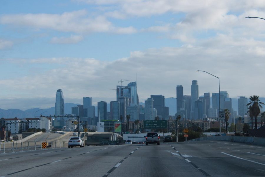 The Downtown Los Angeles skyline looms over a mostly empty Northbound I-110 freeway on Tuesday, April 7, at 9 AM. Due to statewide stay-at-home orders, freeways that are usually full of commuters making their way to work at this time have been left largely abandoned. Jaime Solis/The Union