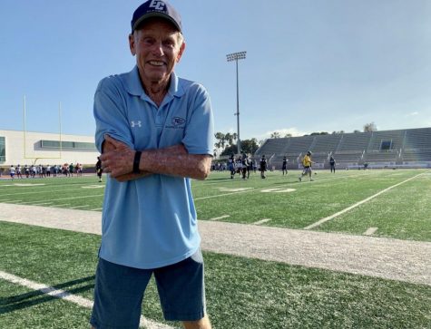 Former head football coach John Featherstone stands in front of the Murdock Stadium field (before being renamed Featherstone Field) during football practice Wednesday, August 21, 2019. Featherstone's love for football continued throughout his entire life, even after retirement in 2015. Jose Tobar / The Union