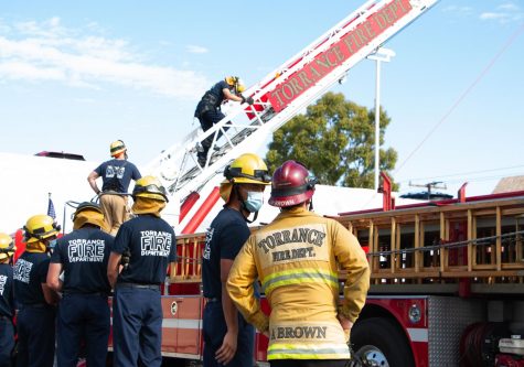 Each Torrance fire recruit must be tested on climbing the fire engine ladder. Engine ladders are 
essential to reach high areas and roofs in a fire. Adam Brown observes and assesses their performance.