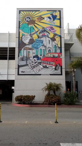 A young Keith Morris sings while leaning over the old Baptist church. Mural #8, located at 13th Street and Hermosa Avenue, memorializes Hermosa Beach’s punk rock and skate culture through this public art unveiled in 2018. Photo credit: Elsa Rosales