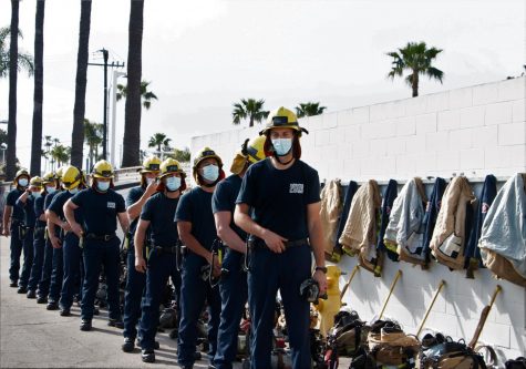 The new Torrance Fire recruits train weekly. Recruits line up waiting for the instructions from a captain. Helmets are required for safety when climbing the fire engine ladder. Each recruit will face many scenarios to prepare them for real emergency calls.