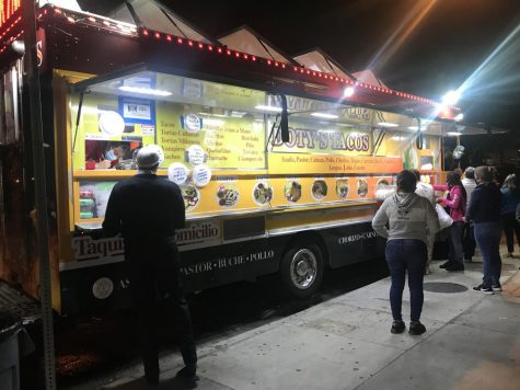 This is the side view of the Doty’s Tacos truck where you can see their menu and different dishes, located in Gardena on Saturday, Nov 21. (Photo by Margarita Sipaque/ Warrior Life)